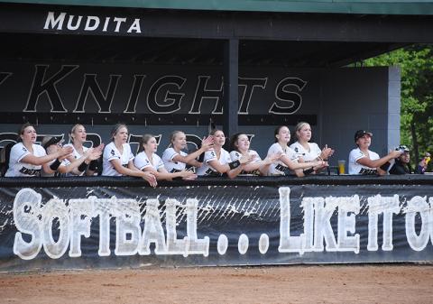Members of the Robbinsville Lady Knights root on the team during May 10's second-round playoff game against Murphy. From left are Dreylee Webster, Ella Atwell, Anna Williams, Payton Odom, Ella McGuire, Sydney Adams, Delaney Brooms, Olivia Lewis, Claire Barlow, Liz Carpenter, Naomi Taylor and manager Ruthie Aguirre. Photo by Jacquline Gayosso/The Graham Star 