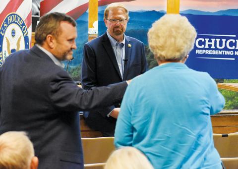 Rep. Chuck Edwards listens intently while a member of the audience shares her concerns over the closing of Cable Cove Campground during Edwards’ town hall visit June 20. Photos by Kevin Hensley/editor@grahamstar.com