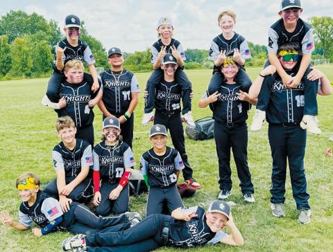 The 10U Robbinsville Black Knights were able to enjoy the week of a lifetime in August, traveling to Ohio to  compete in the inaugural Savannah Bananas Ball Youth Tournament. All names are listed from left in each row. Laying in front: Dake Haney and Jacob Emmons. Kneeling: Jax Mullinax, Jameson Baxter and Baylor Nichols. Standing: A.J. Farr, Canyan Gross, Kyson Carpenter, Kasen Garrison and Levi Millsaps. On shoulders: Lawton Gibby, Daylon Anderson, Brayden Menard and Eli Nelms.