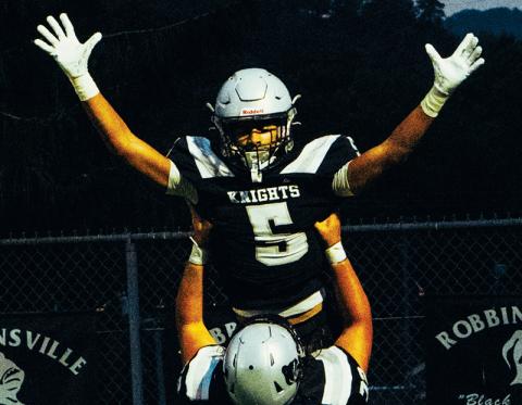Darion Ledbetter (5) celebrates with Tytan Teesateskie after scoring his first of two touchdowns during Sept. 12’s rout over Copper Basin. Photos by Royce Worbington/The Graham Star