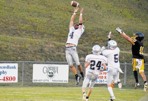 Cameron Allison (4) had other plans for Peyton Baine's pass to Brodie Betts (11), making a mid-air denial by roping in his second interception of the game Monday at Murphy. Allison's pick transitioned into Robbinsville scoring the game-clinching touchdown. Photos by Kevin Hensley/sports@grahamstar.com