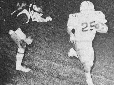 In this photo from the Oct. 19, 1975 clash between Murphy and Robbinsville, Teddy Phillips rushes for a touchdown.
