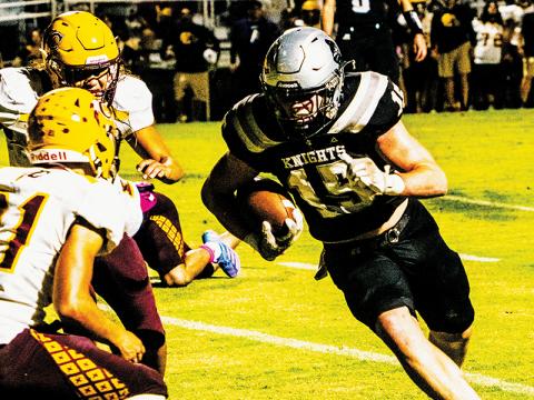 Senior Roman Jones prepares to lower the boom on Cherokee’s Kingston Welch en route to one of his five trips into the end zone Friday. Photos by Royce Worbington/The Graham Star