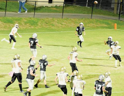Braylon Blevins (17) watches for Eli Lambert (11) to catch a two-point conversion pass in JV action Monday against Hayesville. Lambert completed the exchange, to round out the Black Knights’ 30-12 win. Photo by Jacquline Gayosso/The Graham Star