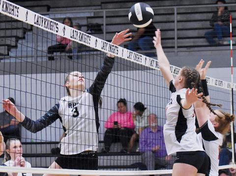 Senior middle hitter Claire Barlow – who led the 1A West in kills (338) before Tuesday’s playoff match – pulls some chicanery to slip the ball past Rosman’s Lilly Orr and Lillie Dodson. Robbinsville advanced to the second round of the postseason after besting its former conference rival in four sets. Photos by Jacquline Gayosso/The Graham Star