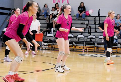 The Lady Knights prepare to defend the back row Tuesday against Swain County. Pictured are Claire Barlow, Daphne Barlow (5), Ryn Hooper and Liz Carpenter (20). Photo by Cheyanne Geyer/The Graham Star
