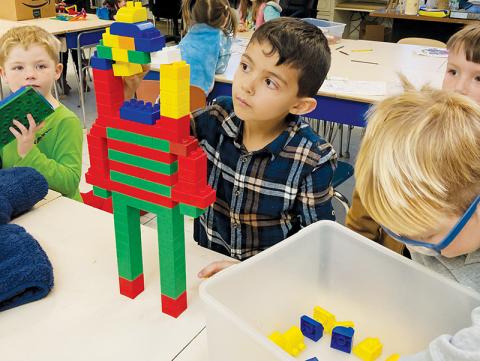 Kindergartners Braxton Clark, Jack Portal, Hunter Gonzalez and Axel Orr (from left) work with Legos as part of STEAM activities at Robbinsville Elementary School. Photo by Dusty Orr/Robbinsville Elementary School