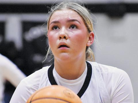 Senior Liz Carpenter sizes up a free throw Monday against Smoky Mountain. Through the first three games of the year, Carpenter is averaging 15.3 points per game. Photo by Bella Eddings/The Graham Star