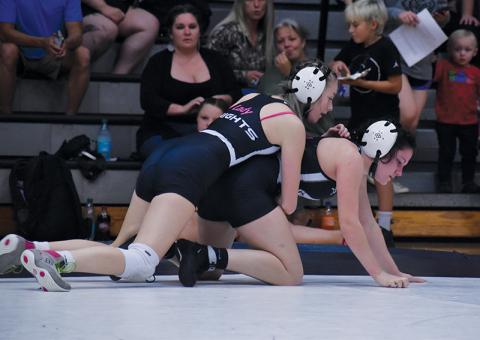 Latesha Orr grabs top control on Velvet Carver during Nov. 7’s scrimmage. Photo by Bella Eddings/The Graham Star