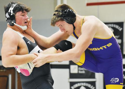 Robbinsville’s Kellen Ensley brushed off a desperate attempt by North Henderson’s Aden Slusser to break up this standing single-leg to win the 215-pound bout in the third period Jan. 22. Photos by Bella Eddings/The Graham Star