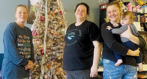 Friendly faces greet those who visit the Reigniting Hope Foundation, which launched last year with an initiative to help those who are homeless or have fallen into the struggles of addiction. From left are Tracey Jones, Shelby Jones, Jessica Jones and Raylon Jones. Photo by Latresa Phillips/The Graham Star