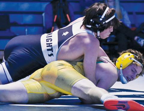 Knox Orr controls Alleghany’s Elijah Barker during the second round of the state dual-team postseason Saturday. Orr went on to pin Barker and clinch a third-round berth for Robbinsville. Photos by Bella Eddings/The Graham Star