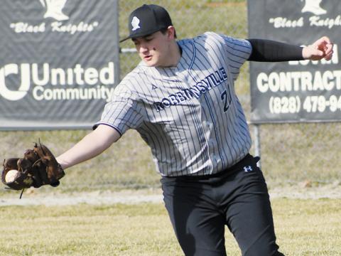 Avery Webster makes a running catch in right field Monday against Rosman. Photo by Lexie Anderson/The Graham Star