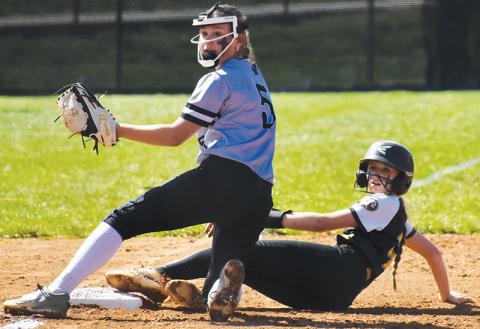 Middle school Lady Knight Lakin Orr awaits the call after tagging a Murphy baserunner during April 1’s home game. Photos by Bella Eddings/The Graham Star