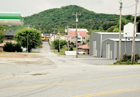 The intersection of Rodney Orr Bypass and Laura Street will be busier than ever next year, thanks to the addition of a 32,000 square-foot retail store that will occupy the space on the left. The  upgraded buildings on the right will serve as an annex of the effort. Photos by Kevin Hensley/editor@grahamstar.com