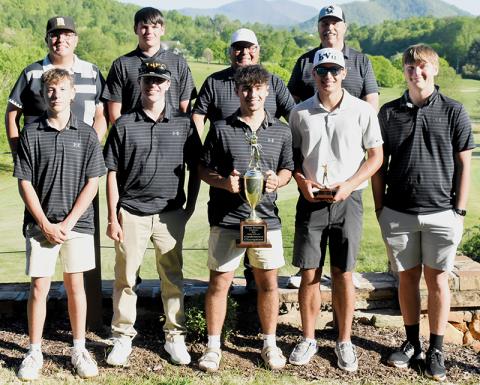 With the setting sun beaming down, the Robbinsville Black Knights soak in the reality of their first Smoky Mountain Conference golf championship in 25 years. The team clinched the title Monday at Mountain Harbour Golf Course in Hayesville, at the conclusion of the two-day league tournament. Photo by Kevin Hensley/sports@grahamstar.com