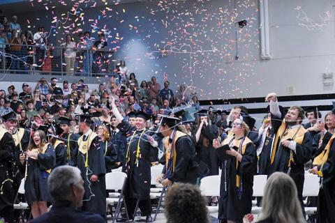 The Robbinsville High School Class of 2025 unwind at the end of Friday’s commencement exercise. Photos by Lexie Anderson/The Graham Star
