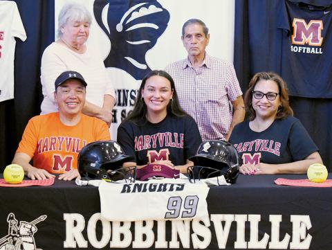 Robbinsville senior Naomi Taylor signed to play with Maryville College on Monday. Seated with Naomi are father Bo (left) and mother Esther. Standing in back are grandparents Joyce and Bob Taylor. Photo by Kevin Hensley/sports@grahamstar.com