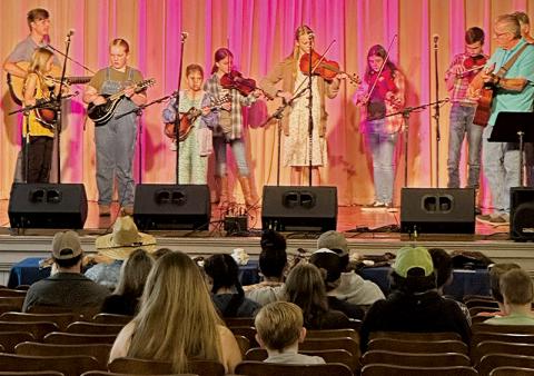 Members of the Stecoah JAM (Junior Appalachian Musicians) program kept attendees entertained at Saturday's SpringFest. Photos by Latresa Phillips/The Graham Star