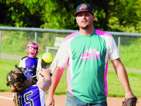 Wyleigh Gibby reaches for a pop-up during Monday's 8U coach-pitch game between Murphy/Ranger All-Stars and Robbinsville. Photo by Kevin Hensley/sports@grahamstar.com