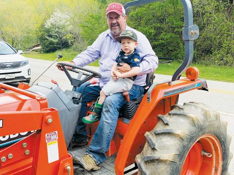 Scott Roper has a long-standing tradition of involving his grandchildren in helping with his garden. Five years ago, he proudly brought along Lennox Burke for a ride on his tractor.