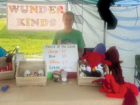 The Graham County Farmers Market has successfully launched a youth entrepreneurship program, which has given local teenagers the opportunity to learn all the steps involved in running a business. Visitors to the weekly market can find booths such as Joshy Kamps' "Wunder Kinds." Photos by Latresa Phillips/The Graham Star