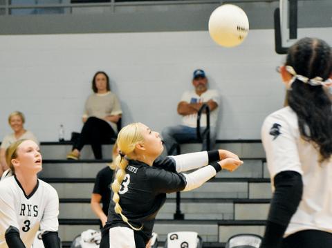 Senior libero Suri Watty bumps the ball during Tuesday’s 4-set win over Murphy. Photo by Bella Eddings/The Graham Star