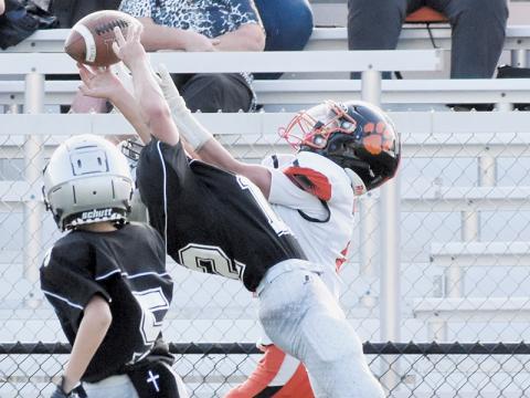 Devin Burchfield intercepts a Rosman pass during the Sept. 11 JV football game. Photo by Lexie Anderson/The Graham Star