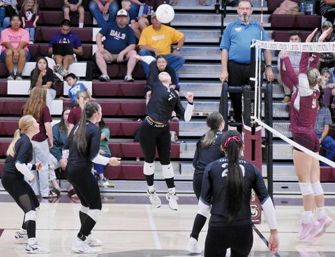 Ella McGuire leaps for a kill attempt Sept. 4 at Swain County. Photo by Kevin Hensley/sports@grahamstar.com