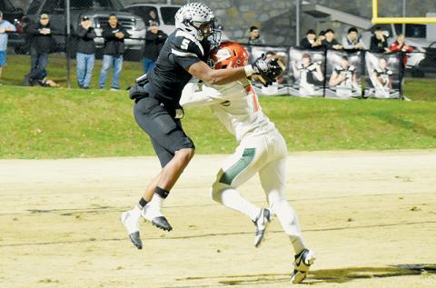 Kyzik Teesateskie’s first-quarter catch Friday was one that will be discussed for years to come. The only pass thrown to the senior was snagged behind the helmet of East Columbus cornerback Gabriel Green and quickly resulted in a 34-yard scoring reception. Photo by Kevin Hensley/sports@grahamstar.com