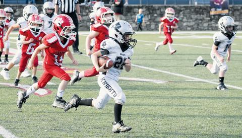 Bass Woods scored the final touchdown of the Robbinsville PeeWees’ season and recorded a pair of conversion runs in Saturday's Cracker Bowl game against Franklin. Photos by Lexie Anderson/The Graham Star