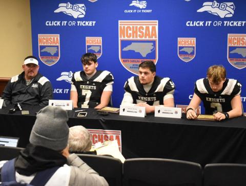 Members of the Robbinsville Black Knights address the media during Thursday's 1A state championship, post-game press conference. From left are head coach Lucas Ford, Isiac Collins, Kellen Ensley and Luke Lovin. Photo by Kevin Hensley/sports@grahamstar.com