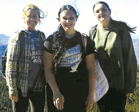 Robbinsville High School CTE Instructor Megan Williams (left) joins students Ashley Howell (center) and Jazmin Crisp atop Mount LeConte during the program's recent field trip.