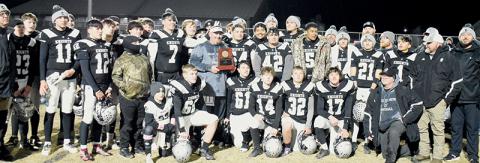 The Robbinsville Black Knights gather in the middle of Bob Colvin Field on Friday, moments after defeating South Davidson to capture the program's 14th 1A Western Regional championship. Photos by Kevin Hensley/sports@grahamstar.com 