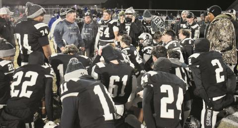 The Robbinsville Black Knights gather for the final home, post-game chat of the 2025 season Nov. 28, moments after clinching the 1A Western Regional title on Bob Colvin Field at Modeal Walsh Memorial (Big Oaks) Stadium. Photo by Kevin Hensley/sports@grahamstar.com