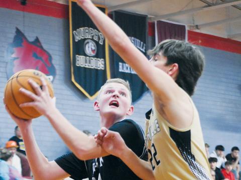 Robbinsville’s Micah York was the Black Knights’ leading scorer in Jan. 12’s season wrap-up: the semifinals of the divisional tournament, which was contested against Hayesville. Photos by Kevin Hensley/sports@grahamstar.com