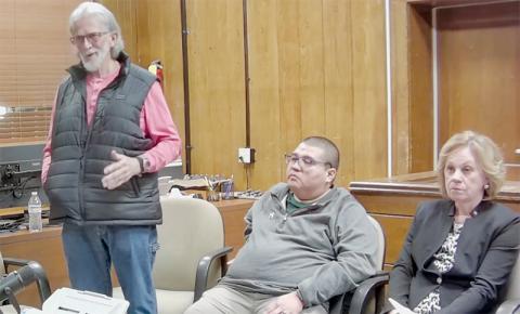 Commission candidate Dale Wiggins (left) delivers his closing statement at Saturday’s forum. Sitting alongside Wiggins are candidates Brian “Taco” Johnson (center) and Carolyn Stewart. Stills courtesy of The Graham Star's YouTube