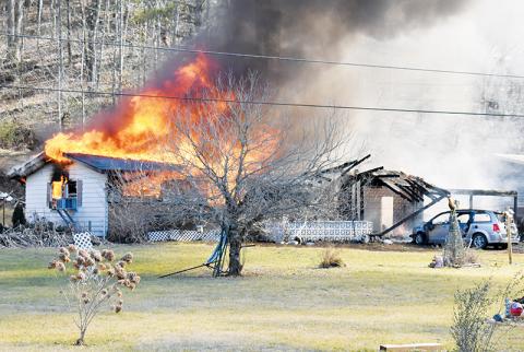 The home of Jim and Lela Hyde erupted in flames Feb. 12. Firefighters were unable to save the residence. Photo by Kevin Hensley/editor@grahamstar.com