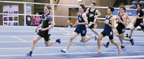 Robbinsville's Nathan Frederick leads a pack of runners during the 1,000-meter run at Jan. 28's meet in Mill Spring. Photos by Kevin Hensley/sports@grahamstar.com