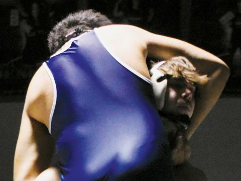 Brayden Lane manhandles Bonnie Cone Leadership Academy's Achilles Ochoa during the second round of the dual-team postseason Tuesday. Photo by Kevin Hensley/sports@grahamstar.com