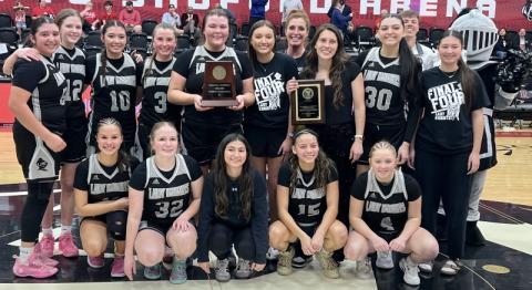 The Robbinsville Lady Knights display the North Carolina High School Athletic Association's 1A Western Regional Championship, moments after defeating Andrews 53-38 in the title game Thursday at Lenoir-Rhyne University. Photos by Kevin Hensley/sports@grahamstar.com