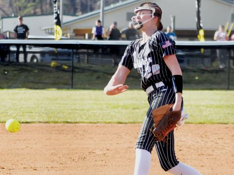 Ella Nelms delivers a pitch during March 3's season opener against  Rosman. Nelms has not given up a run this year and has already struck out 61 batters. Photo by Bella Eddings/The Graham Star