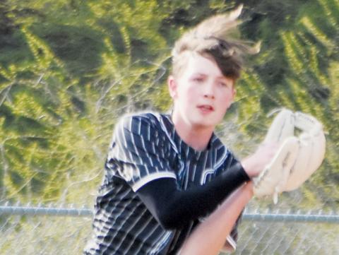 Everett Taylor makes a running catch March 20 against Andrews. Photo by Kevin Hensley/sports@grahamstar.com
