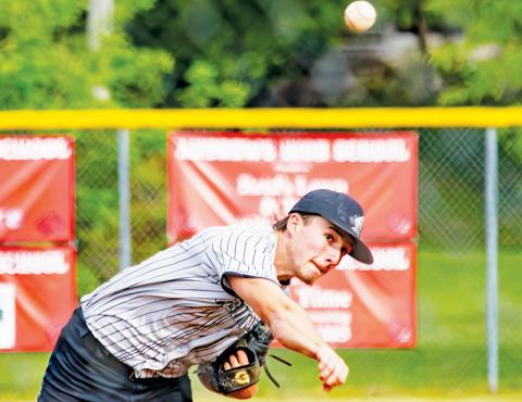 Robbinsville senior Luke Lovin delivers a pitch during the Black Knights' second-round playoff game Friday at Andrews. Lovin struck out 11 Wildcats across 5 1/3 innings. Photo by Cannon Crompton/Cherokee Scout