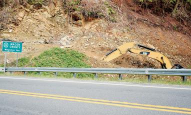 Travelers on U.S. 74 East have undoubtedly noticed this construction site in the Topton community, but the story behind the spot points to a legal mess that led to a Robbinsville man being arrested. Photo by Kevin Hensley/editor@grahamstar.com