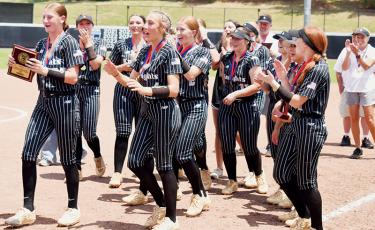 The Robbinsville Lady Knights cheer after being announced as the 1A state champions May 30. The team was recently named one of the Top 25 in the nation. Photo by Kevin Hensley/editor@grahamstar.com