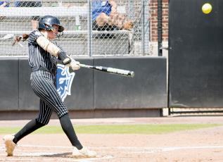 Ella Nelms drives the ball during Game 2 of the 1A state championship series May 30. Nelms was recently named to the MaxPreps Small Town All-American Team. Photo by Kevin Hensley/editor@grahamstar.com