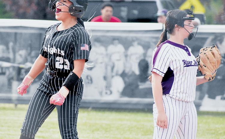Suri Watty celebrates after reaching second base in Robbinsville's second-round playoff rout of River Mill Academy on May 8. Photo by Bella Eddings/The Graham Star