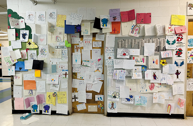 The passing of beloved Robbinsville Elementary School custodian Mike Hyde ushered in a bevy of tributes. Here, a wall on the 4th/5th grade hallway surrounding his work closet is filled with cards from students who will always remember “Mr. Mike.” Photo by Latresa Phillips/The Graham Star