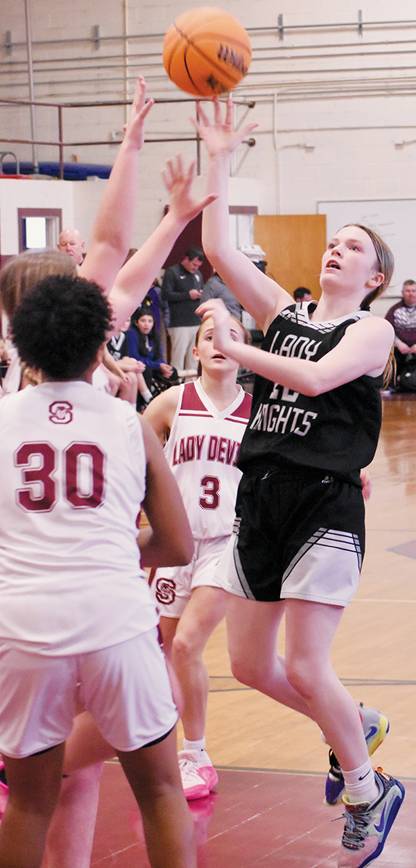Daphne Barlow eyes the basket while airing out a shot Jan. 8 at Swain County. Barlow’s free throws in overtime Saturday helped send Robbinsville to the conference tournament semifinals. Photo by Kevin Hensley/sports@grahamstar.com